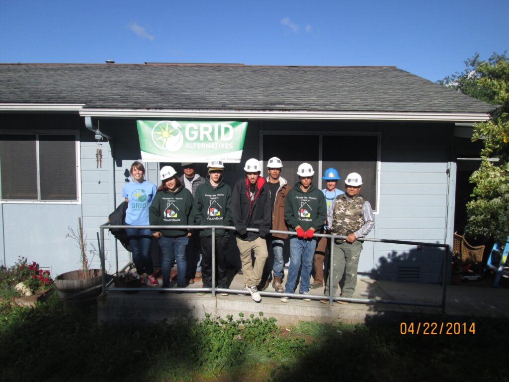 Maggie standing next to Bay Area's North Coast office volunteers