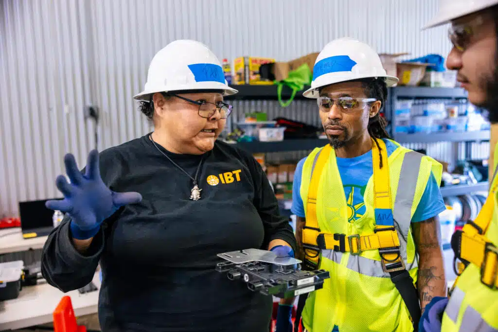 An IBT instructor explaining an IBT trainee information